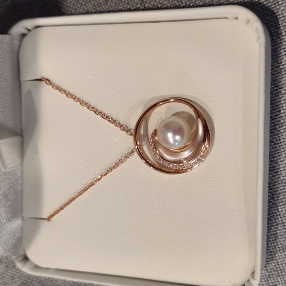 Rose gold wave pendant